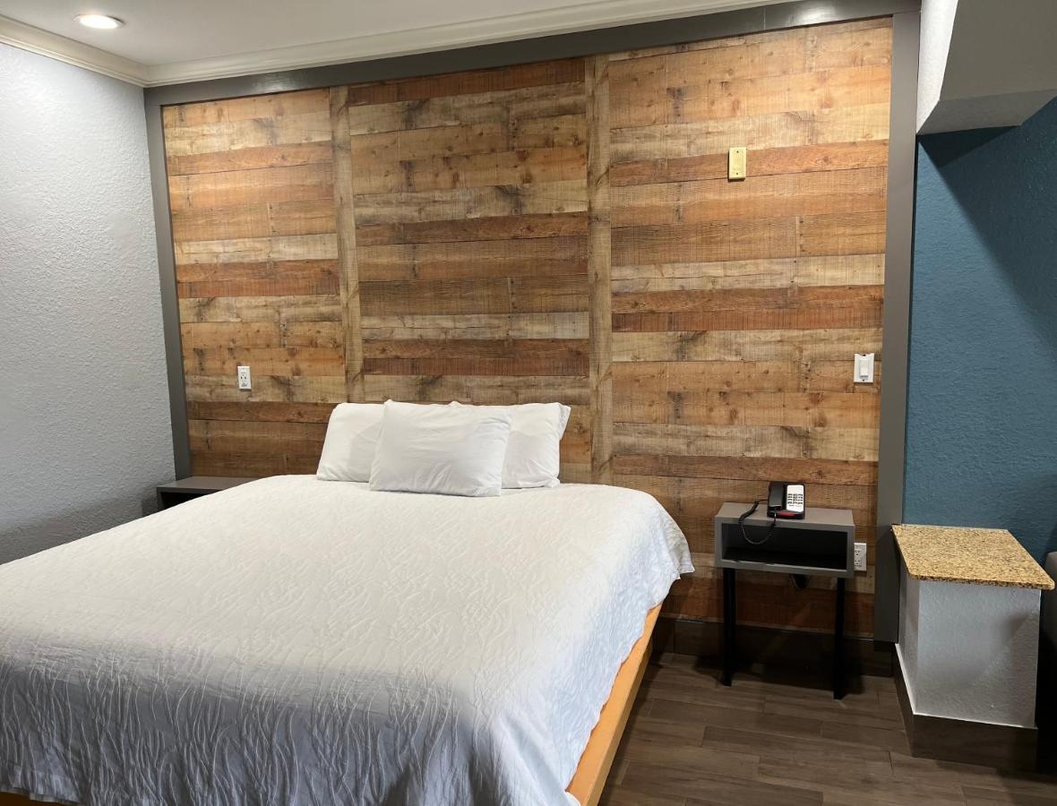 The Symphony Inn & Suites Хьюстон Экстерьер фото